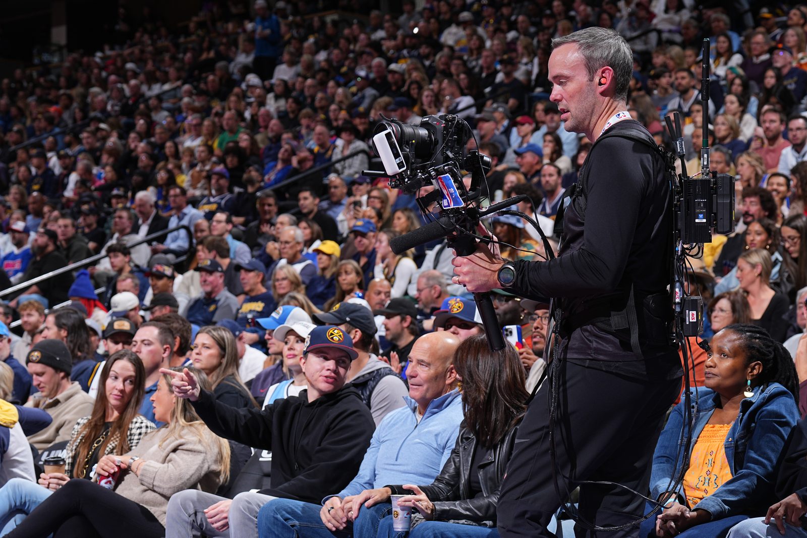 Matt Lingerfelt on a DJI RS 4 Pro gimbal courtside in Denver
